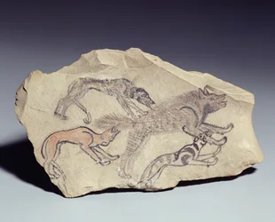 Ostracon que representa un perro persiguiendo a una hiena